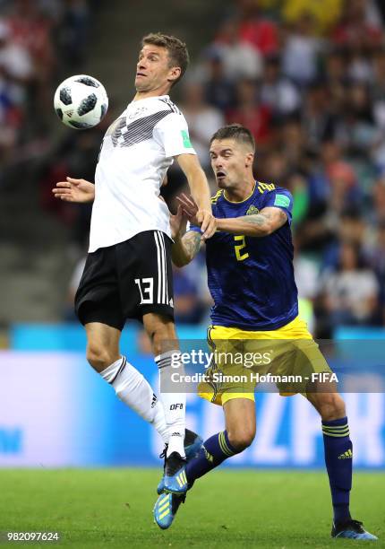 Thomas Mueller of Germany controls theball under pressure from Mikael Lustig of Sweden during the 2018 FIFA World Cup Russia group F match between...