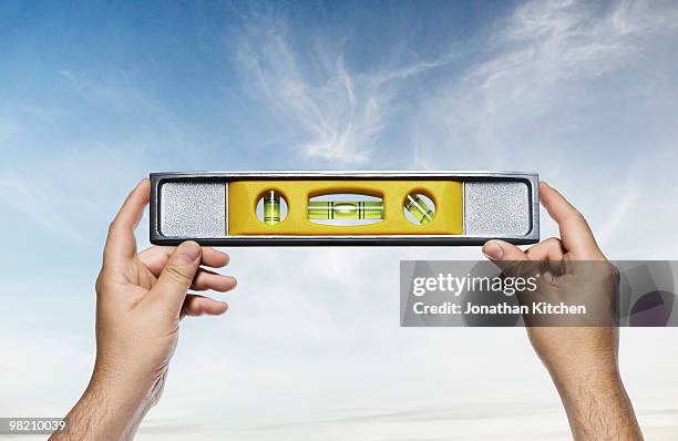 builders level against sky - spirit level stock pictures, royalty-free photos & images