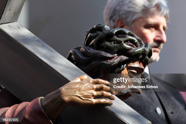 Members of the town's crafts guilds participate in a Good Friday procession on April 2, 2010 in Lohr am Main, Germany. Several thousands of faithful...