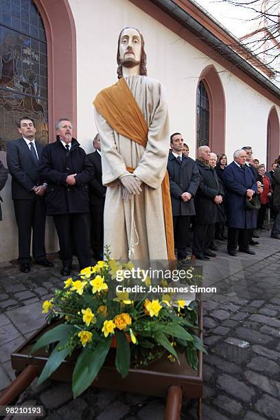 Catholic believers flock the road during a Good Friday procession on April 2, 2010 in Lohr am Main, Germany. Several thousands of faithful took part...