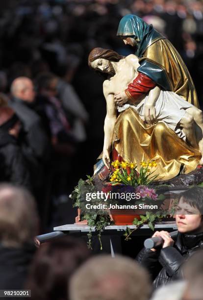 Catholic believers flock the road during a Good Friday procession on April 2, 2010 in Lohr am Main, Germany. Several thousands of faithful took part...