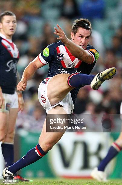 Mitchell Pearce of the Roosters kicks during the round four NRL match between the Sydney Roosters and the Brisbane Broncos at Sydney Football Stadium...