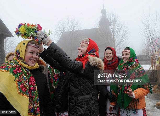 Belarus women, wearing traditional costums, sing songs outside Minsk, in the village of Ozertso on March 21, 2010 to celebrate the vernal equinox....