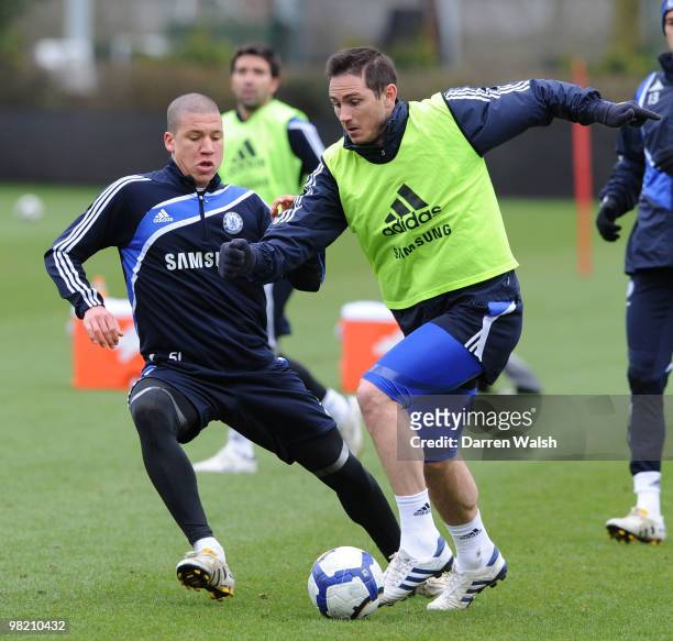 Frank Lampard, Jeffrey Bruma of Chelsea during a training session at the Cobham Training Ground on April 2, 2010 in Cobham, England.