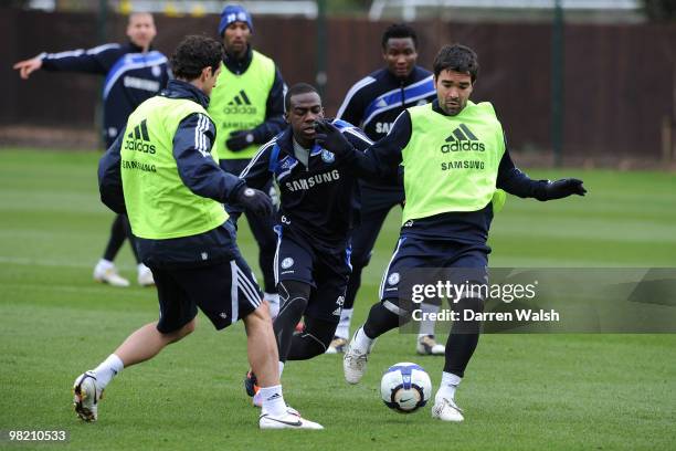 Gael Kakuta and Deco of Chelsea during a training session at the Cobham Training Ground on April 2, 2010 in Cobham, England.