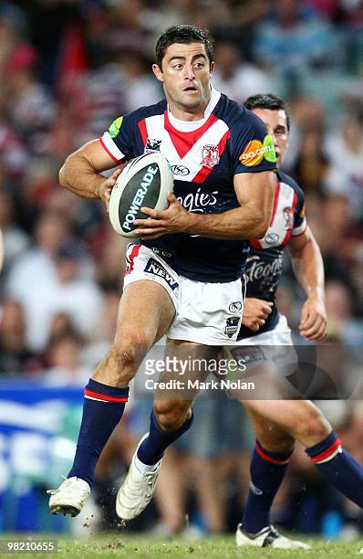 Anthony Minichiello of the Roosters runs the ball during the round four NRL match between the Sydney Roosters and the Brisbane Broncos at Sydney...
