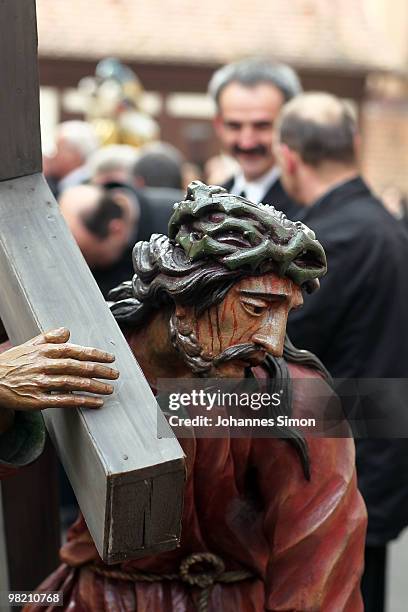 Wooden sculpture depicting Jesus Christ is displayed ahead of a Good Friday procession on April 2, 2010 in Lohr am Main, Germany. Several thousands...