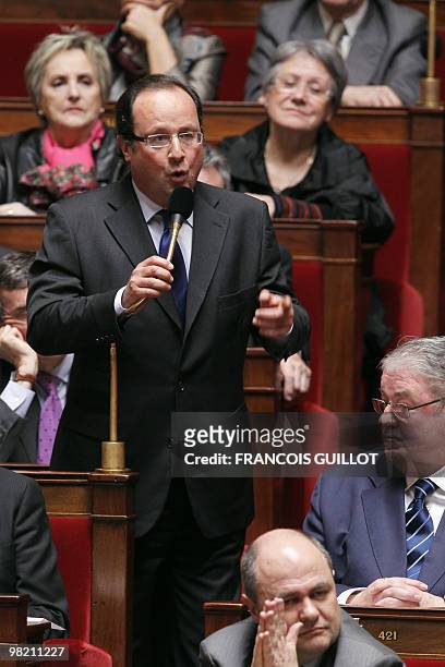 Former French general secretary of the Socialist party Francois Hollande delivers a speech, on March 31 during the weekly session of questions to the...