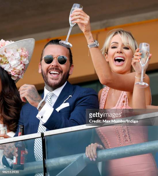 Pete Wicks and Olivia Attwood watch the racing as they attend day 3 'Ladies Day' of Royal Ascot at Ascot Racecourse on June 21, 2018 in Ascot,...
