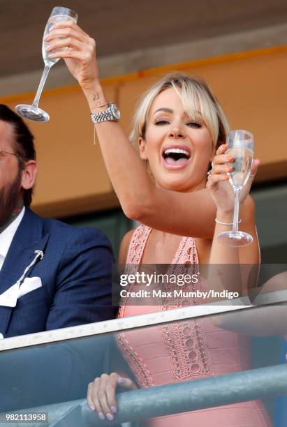 Olivia Attwood watches the racing as she attends day 3 'Ladies Day' of Royal Ascot at Ascot Racecourse on June 21, 2018 in Ascot, England.