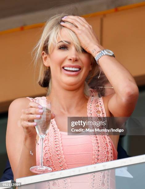 Olivia Attwood watches the racing as she attends day 3 'Ladies Day' of Royal Ascot at Ascot Racecourse on June 21, 2018 in Ascot, England.