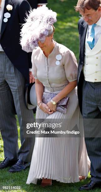 Sophie, Countess of Wessex curtsies to Queen Elizabeth II on day 3 'Ladies Day' of Royal Ascot at Ascot Racecourse on June 21, 2018 in Ascot, England.