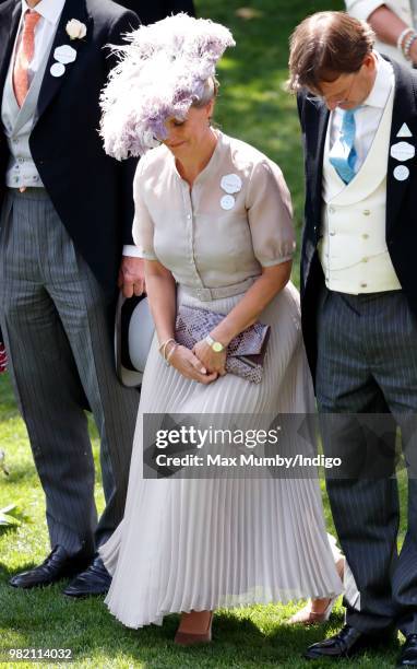 Sophie, Countess of Wessex curtsies to Queen Elizabeth II on day 3 'Ladies Day' of Royal Ascot at Ascot Racecourse on June 21, 2018 in Ascot, England.