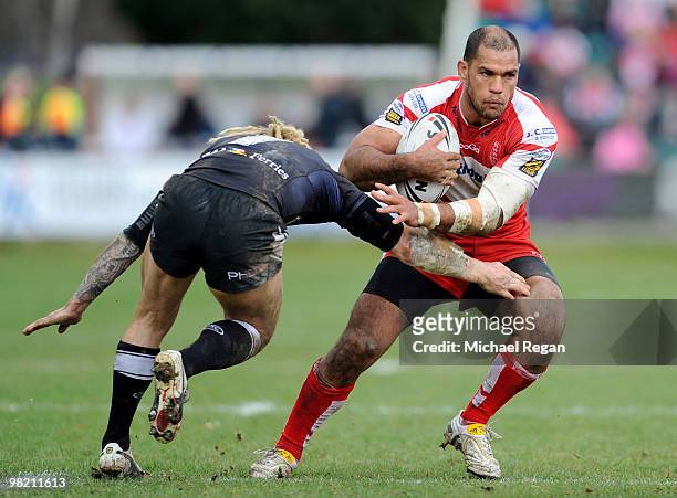 Sean Long of Hull FC tries to tackle Jake Webster of Hull KR during the engage Super League match between Hull Kingston Rovers and Hull FC at Craven...