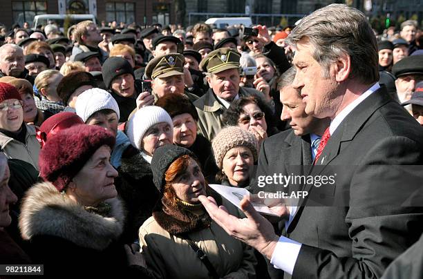 People surround former Ukraine's President Viktor Yushchenko during his private visit to the western city of Lviv on March 10, 2010. AFP PHOTO/ YURIY...