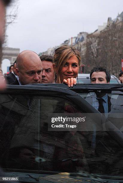 Actress Jennifer Aniston leaves the premiere of the film 'Le chasseur de Primes' at Cinema Gaumont Marignan on March 28, 2010 in Paris, France.