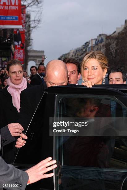 Actress Jennifer Aniston leaves the premiere of the film 'Le chasseur de Primes' at Cinema Gaumont Marignan on March 28, 2010 in Paris, France.