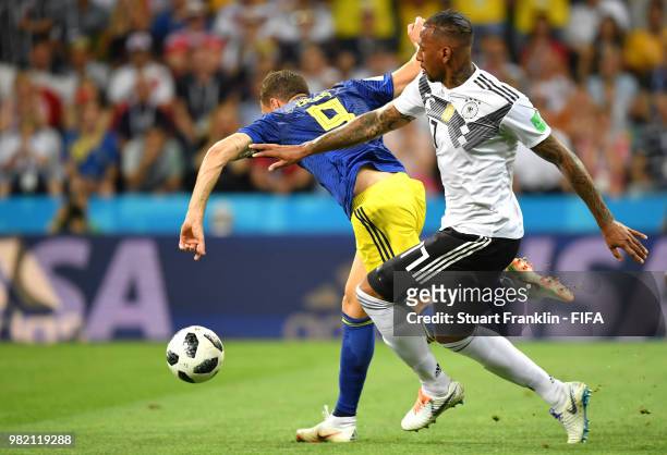 Marcus Berg of Sweden goes down in the penalty area from challenge by Jerome Boateng of Germany during the 2018 FIFA World Cup Russia group F match...