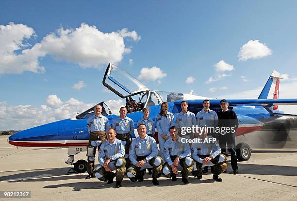 France's first lady Carla Bruni-Sarkozy , patron of the French aerobatic squadron "Patrouille de France" poses with pilots after an exhibition in...