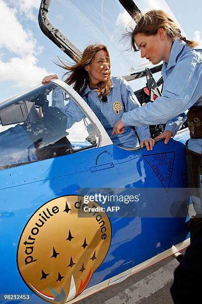 France's first lady Carla Bruni-Sarkozy , patron of the French aerobatic squadron "Patrouille de France" sits in the cockpit of an Alpha jet with...