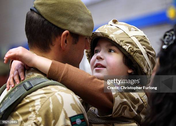 Five-year-old Ashton Peterson welcomes home his father Sergeant Carl Peterson, of 2nd Battalion The Yorkshire Regiment , home as he returns from...