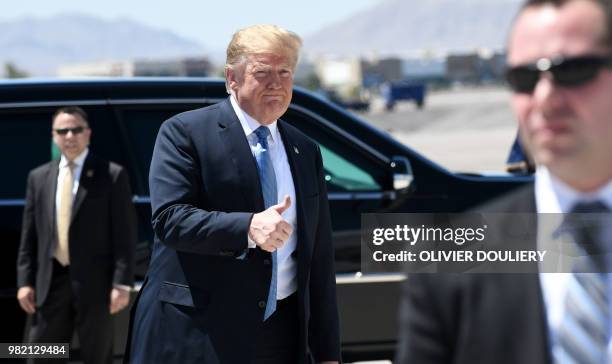 President Donald Trump arrives at McCarran International Airport in Las Vegas, Nevada, on June 23, 2018. - Trump will be attending a fundraiser and...