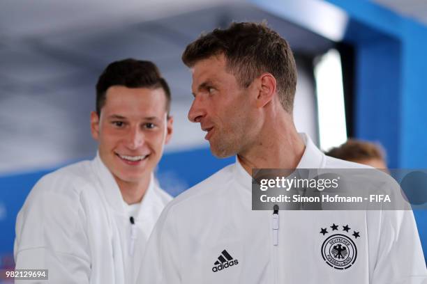 Thomas Mueller of Germany and teammate Julian Draxler are seen prior to the 2018 FIFA World Cup Russia group F match between Germany and Sweden at...