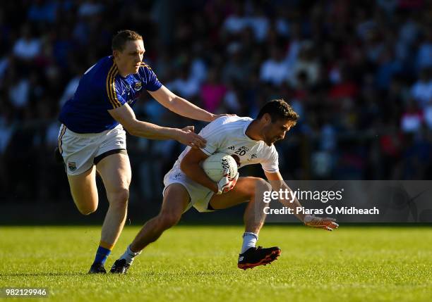 Longford , Ireland - 23 June 2018; Éanna O'Connor of Kildare in action against Patrick Fox of Longford during the GAA Football All-Ireland Senior...