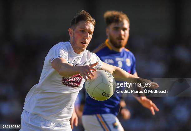 Longford , Ireland - 23 June 2018; Neil Flynn of Kildare shoots under pressure from Conor Berry of Longford during the GAA Football All-Ireland...