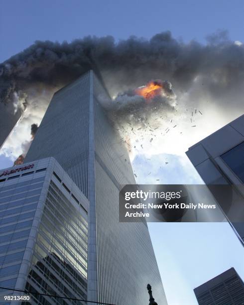 Flames spew out of 2 World Trade Center after it is struck by a commercial airliner in a terrorist attack on September 11, 2001 in New York City. A...