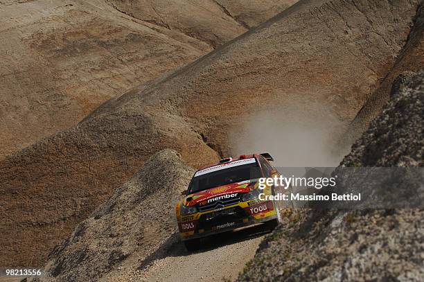 Petter Solberg of Norway and Phil Mills of Great Britain compete in their Citroen C4 during Leg 2 of the WRC Rally Jordan on April 2, 2010 in Amman,...