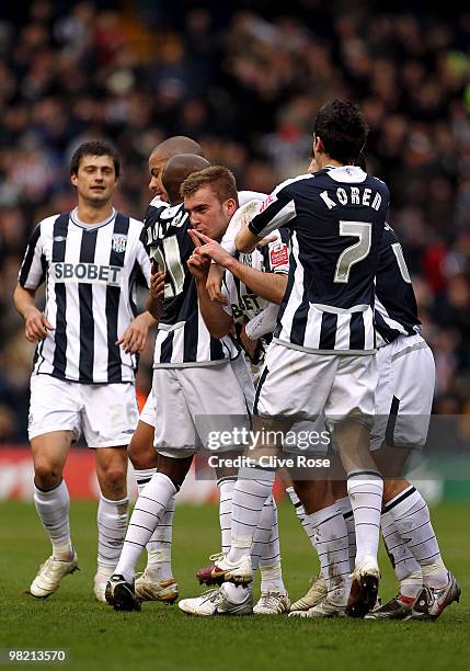 James Morrison of West Bromwich Albion celebrates his goal with team mates during the Coca Cola Championship match between West Bromwich Albion and...