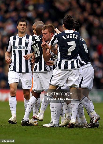 James Morrison of West Bromwich Albion celebrates his goal with team mates during the Coca Cola Championship match between West Bromwich Albion and...