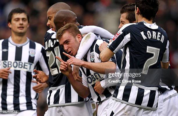 James Morrison of West Bromwich Albion celebrates his goal with team mates during the Coca Cola Championship match between West Bromwich Albion and...