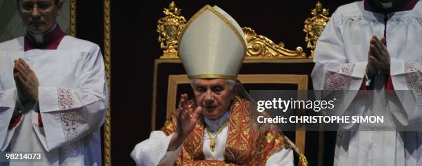 Pope Benedict XVI wears the Papal Tiara during the celebration of the Lord's Passion on Good Friday on April 2, 2010 at Saint Peter's Basilica at The...