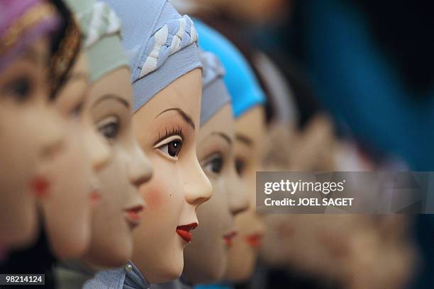 Veils are displayed on a women fashion stall of the annual meeting of French Muslims organized by the Union of Islamic Organisations of France in Le...