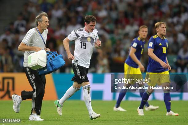 Sebastian Rudy of Germany runs off to receive treatment for a bloody nose during the 2018 FIFA World Cup Russia group F match between Germany and...
