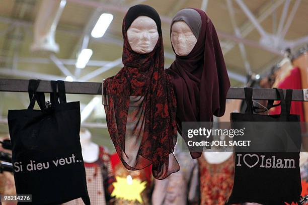 Veils and bags are displayed in a stall during the annual meeting of French Muslims organized by the Union of Islamic Organisations of France in Le...