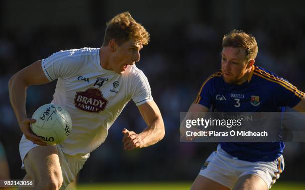 Longford , Ireland - 23 June 2018; Daniel Flynn of Kildare in action against Pádraig McCormack of Longford during the GAA Football All-Ireland Senior...