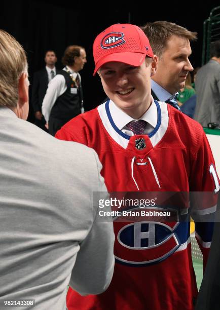 Allan McShane greets his team after being selected 97th overall by the Montreal Canadiens during the 2018 NHL Draft at American Airlines Center on...
