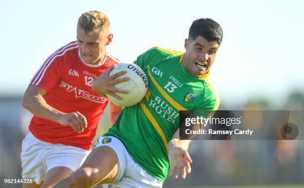 Carrick-on-Shannon , Ireland - 23 June 2018; Emlyn Mulligan of Leitrim in action against Gerard McSorley of Louth during the GAA Football All-Ireland...