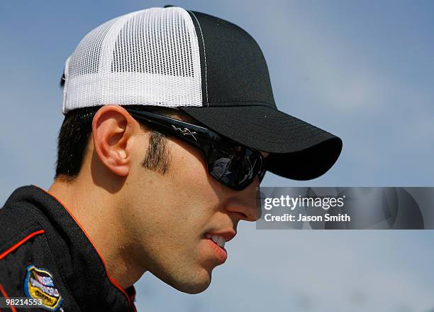 Aric Almirola, driver of the#51 Graceway Enterprises Chevrolet, looks on during practice for the NASCAR Camping World Truck Series Nashville 200 at...