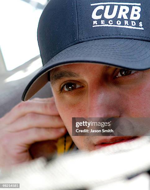 Johnny Sauter sits aboard the Curb Records Chevrolet during practice for the NASCAR Camping World Truck Series Nashville 200 at Nashville...