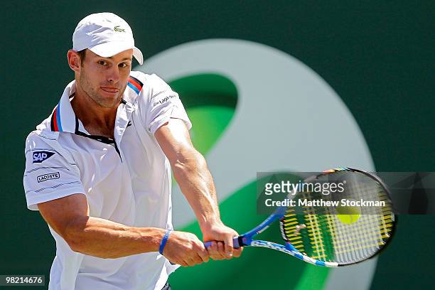 Andy Roddick of the United States returns a shot against Rafael Nadal of Spain during day eleven of the 2010 Sony Ericsson Open at Crandon Park...
