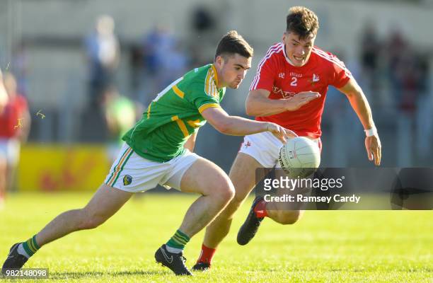 Carrick-on-Shannon , Ireland - 23 June 2018; Ryan O'Rourke of Leitrim in action against Darren Marks of Louth during the GAA Football All-Ireland...