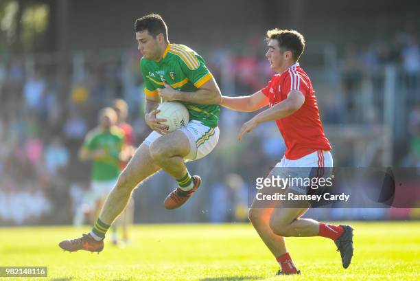 Carrick-on-Shannon , Ireland - 23 June 2018; Damien Moran of Leitrim in action against Emmet Carolan of Louth during the GAA Football All-Ireland...