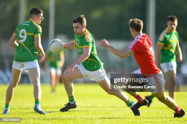 Carrick-on-Shannon , Ireland - 23 June 2018; Ryan O'Rourke of Leitrim in action against Anthony Williams of Louth during the GAA Football All-Ireland...