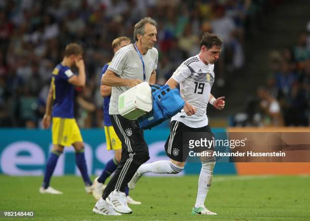 Sebastian Rudy of Germany leaves the pitch to receive treatment during the 2018 FIFA World Cup Russia group F match between Germany and Sweden at...
