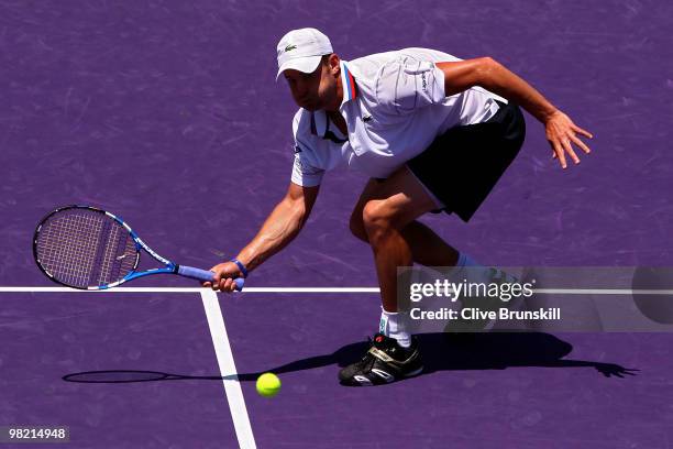 Andy Roddick of the United States returns a shot against Rafael Nadal of Spain during day eleven of the 2010 Sony Ericsson Open at Crandon Park...