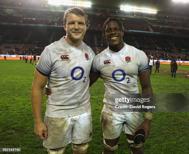 Joe Launchbury and Maro Itoje of England celebrate their victory during the third test match between South Africa and England at Newlands Stadium on...